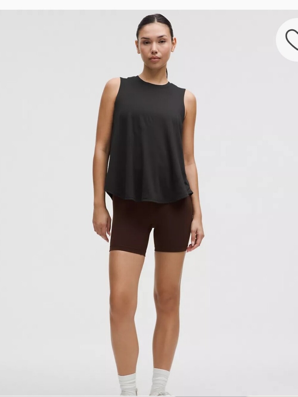 Lululemon tank top features a dropped armhole design, offering a relaxed fit